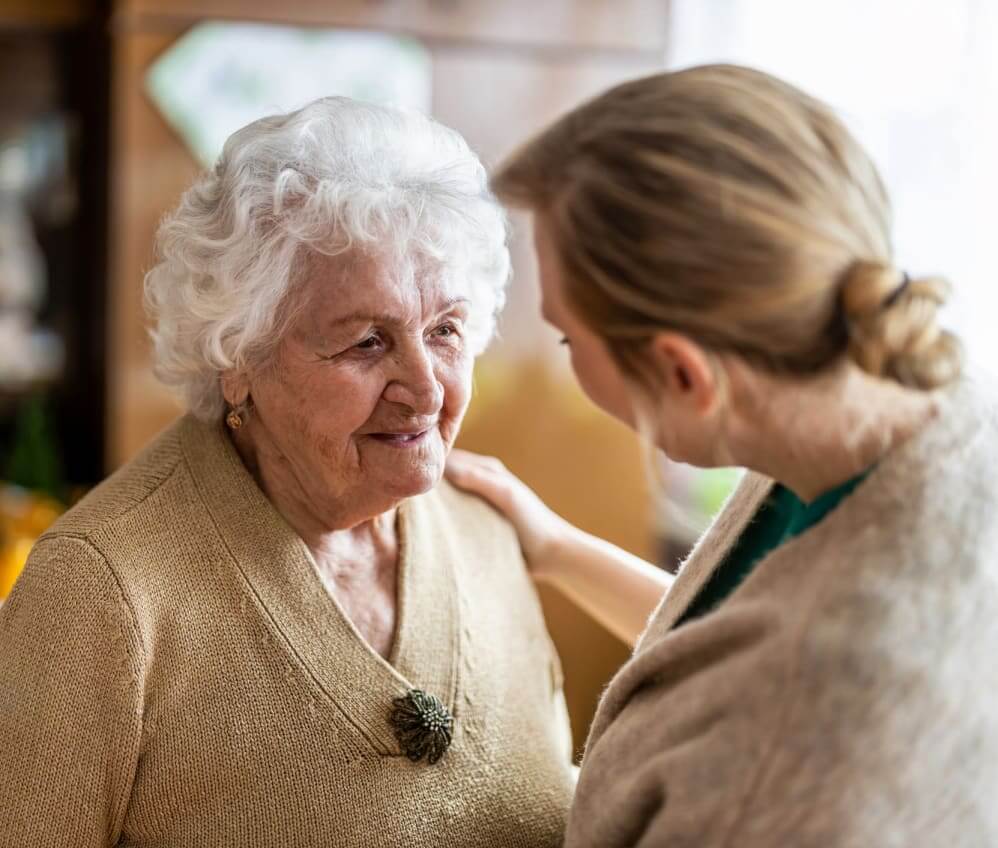 Compassionate-caregiver-assisting-a-memory-care-resident-during-the-overnight-hours