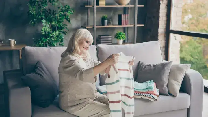 Older woman preparing for the move from independent living to assisted living in Bentonville, Arkansas